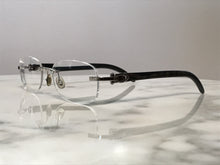 Load image into Gallery viewer, Cartier Platinum Buffalo Horn Rimless Glasses Sunglasses - Braglia
